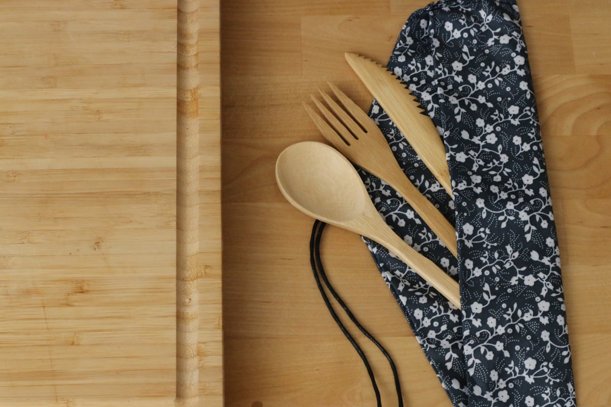 Bamboo cutting board with wooden utensils - eco-friendly kitchen set